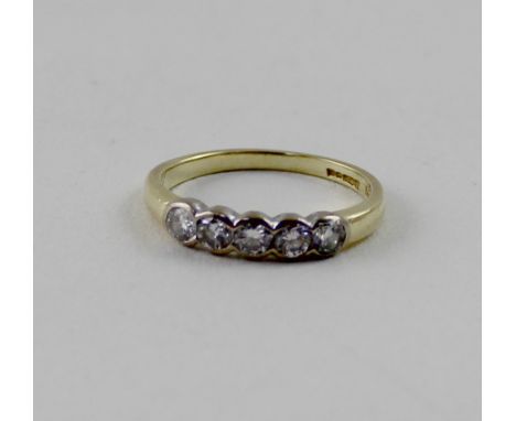 An 18ct yellow gold five-stone collet-set diamond ring, each diamond approx 0.10ct, size K, approx 2.6g.