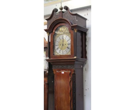 An early 20th century mahogany longcase clock, broken swan neck pediment above a silvered and gilded dial set with Roman nume