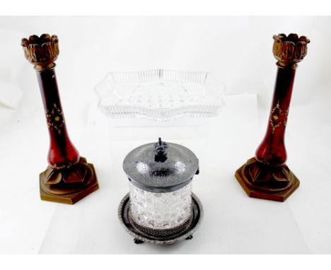 A pair of late 19th/early 20th century candlesticks, each with ruby glass column set between gilt painted metal mounts, heigh