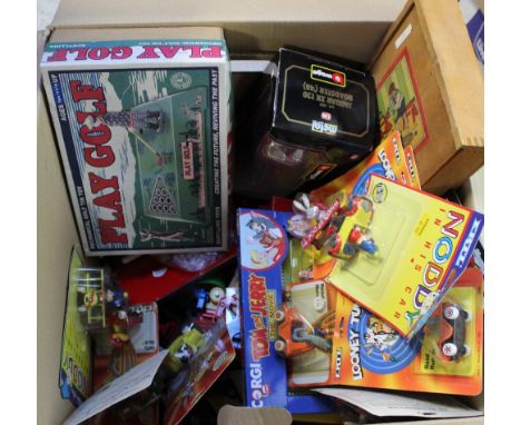 A collection of vintage and collectible toys to include Warner Brothers Ertl blister pack Looney Tunes diecast cars, Corgi 'T