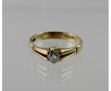 An 18ct yellow gold ladies' dress ring with solitaire diamond, size S, approx 3.9g.