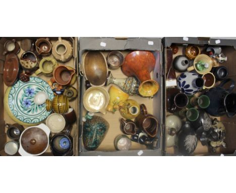 A large quantity of c1970s and later studio art pottery and decorative items to include hand painted plates, jugs, decorative
