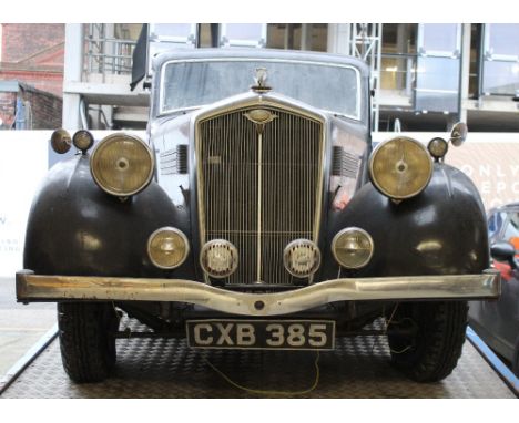 A vintage 1936 black Wolseley two-axle rigid body saloon car, registration number CXB385, chassis number 225/860, engine numb