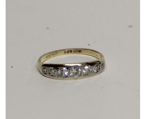 An 18ct yellow gold seven-stone platinum set diamond ring, approx 0.50 points, size N, approx 2.8g.