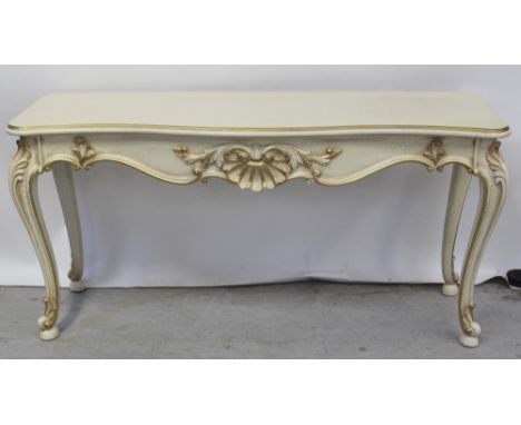 An ornate French-style cream console table, carved decoration to the front, to cabriole supports, length approx 152cm and an 