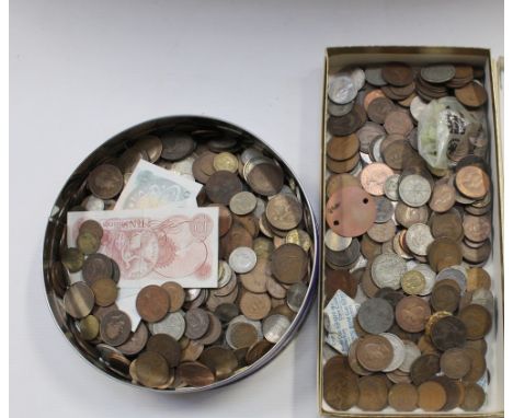 A vintage Cadbury's chocolate biscuit tin containing a quantity of copper and silver coins to include Victorian pennies, othe