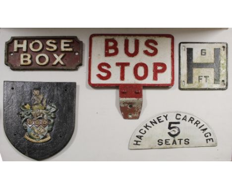 Various cast and metal vintage signs to include 'Bus Stop', 'Hackney Carriage Five Seats', 'Hose Box', street measuring sign 