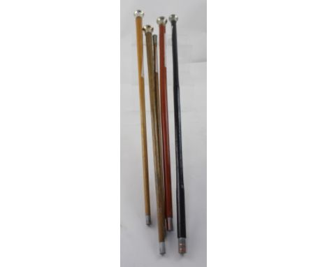 Five various British Army swagger sticks to include The Prince of Wales' Own, The Coldstream Guards, Jersey, Kenya Police and
