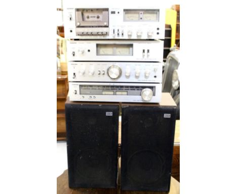 A Toshiba stacking music system to include stereo cassette deck PC335, stereo tuner, pre-amplifier etc.