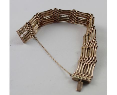 A 9ct rose gold seven bar gate bracelet, approx 24g.