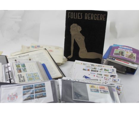 A large quantity of loose stamps and first day covers, a copy of a Folies Bergère programme and a copy of the Times.
