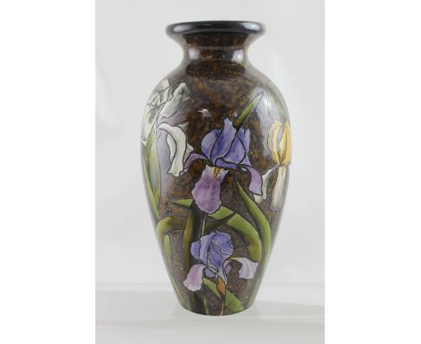 A Dr Christopher Dresser for Linthorpe Pottery art pottery vase of ovoid form, decorated with irises on a brown glazed ground