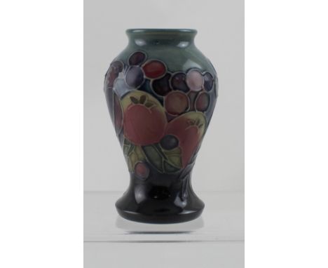 A modern Moorcroft 'Finches' vase with date stamp 1994, height 10cm.