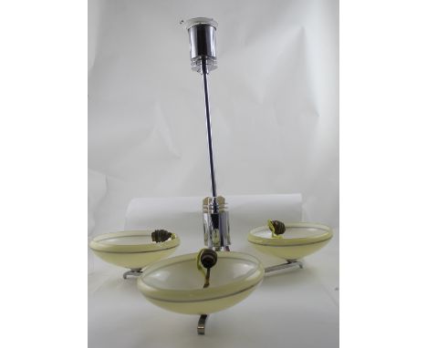 A mid-20th century chromed ceiling light with three circular opaque glass shades with silvered detail, length 62cm, purchased