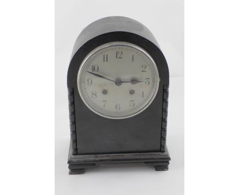 An early 20th century oak-cased eight-day mantel clock, the silvered dial set with Arabic numerals, an Edwardian mahogany inl