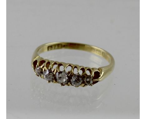 An 18ct yellow gold ladies' dress ring with five graduating diamonds, size Q, approx 3.3g.