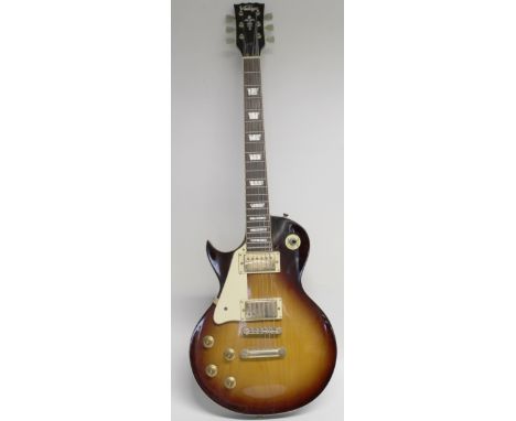 A 'Vintage' V100 reissued left handed electric guitar, Les Paul style in tobacco sunburst finish, Wilkinson double coil picku