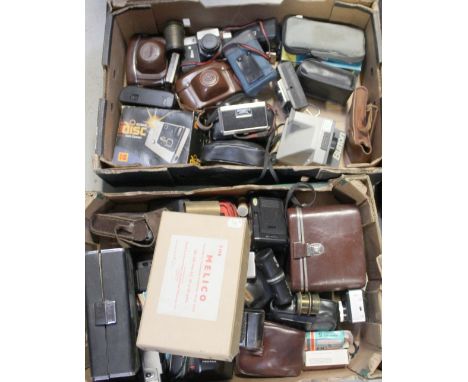 A large collection of assorted cameras to include Polaroid Land camera 'The Button', 'The Melico', various accessories etc.