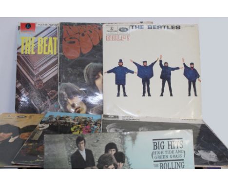 A collection of vinyl LPs to include The Beatles; 'Please Please Me' (x2), Sgt. Pepper's Lonely Hearts Club Band', 'With the 