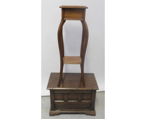 A modern reproduction small oak cabinet and a mahogany square-top plant stand with cabriole legs united by shelf (2).