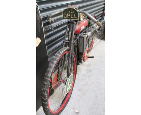 An early 20th century vintage Opel 204cc part motorcycle frame with various additions and modifications. CONDITION REPORT For