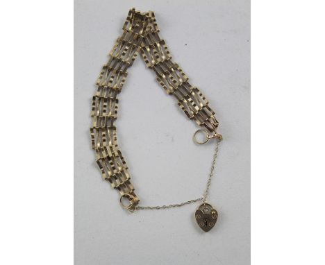 A 9ct yellow gold gate bracelet, approx 5.1g.