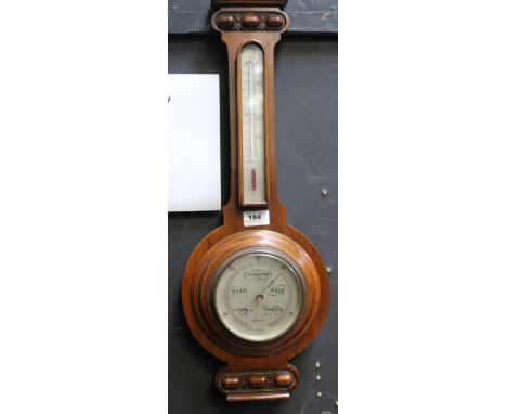 An early 20th century mahogany wall barometer with silvered dial, Walker &amp; Hall, length 50cm.