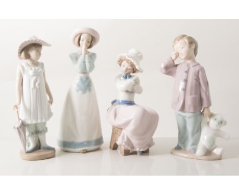 A modern Lladro figural group, Ballerinas, and a collection of Nao Spanish porcelain figures, (14).