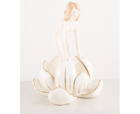 Art Nouveau style Czechoslovakian porcelain table centre-piece, modelled as a girl appearing from a waterlily, cream glaze wi