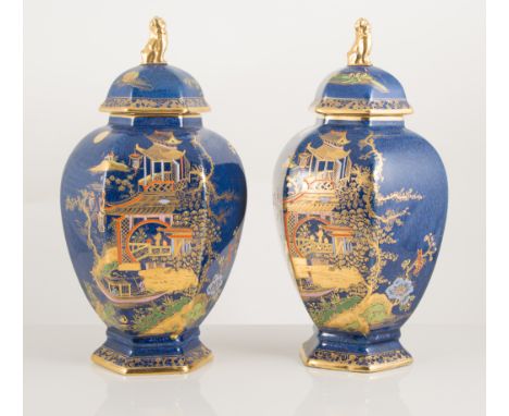 Pair of Carltonware powder blue covered vases, swollen octagonal form, 24.5cm high.