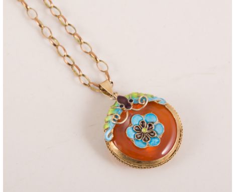 Enamel pendant and chain, circular amber coloured stone held in a gilt mount decorated with red, green and blue enamel with f