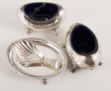 Georgian silver caddy spoon, with a scallop bowl, a Dutch oval silver stand and two Victorian berry spoons, pair of silver sa