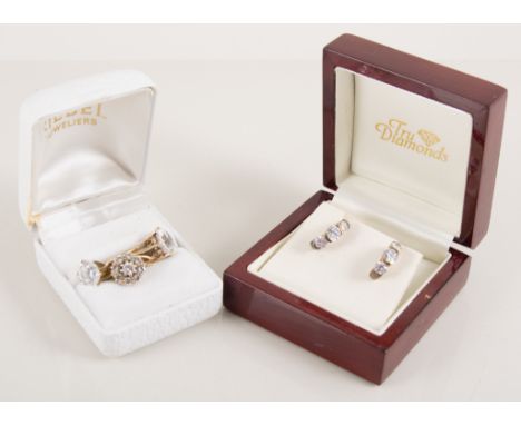 Collection of jewellery all set with synthetic white stones, a 14 carat yellow gold solitaire, two 9 carat gold rings, two so