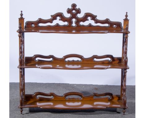 Victorian walnut three-tier graduated and wall-mounted shelf unit, fretted ends, W67cm x D20cm x H76cm.