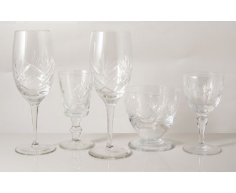 Suite of table glassware, including a decanter, jug, wine glasses and brandy glasses together with other table glassware and 