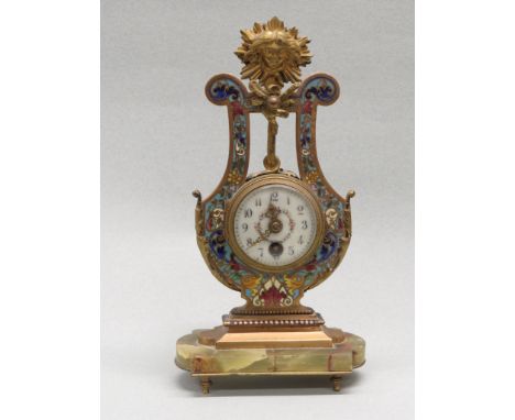 French style ormolu and enamel mantel clock of lyre shape, the white enamel dial (diameter 5cm) with ring of flowers, Arabic 