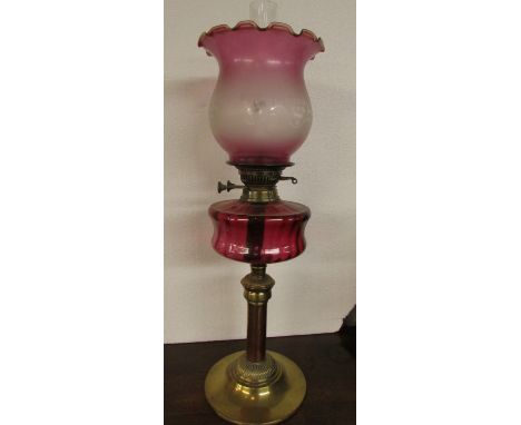 Victorian oil lamp with graduated pink vaseline glass shade etched with stylized bunches of grapes, ruby glass reservoir, pla