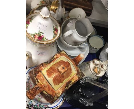 A Royal Albert Old Country Rose style ceramic novelty teapot, together with a quantity of Royal Albert Old Country Rose tea w