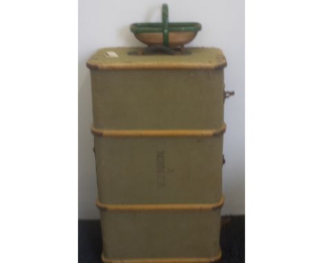 A vintage trunk and a small garden trug