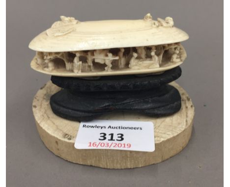 A late 19th/early 20th century Chinese carved ivory shell and another item