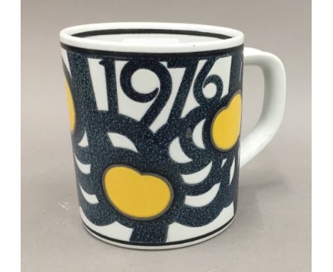 A Royal Copenhagen silver mounted ceramic mug