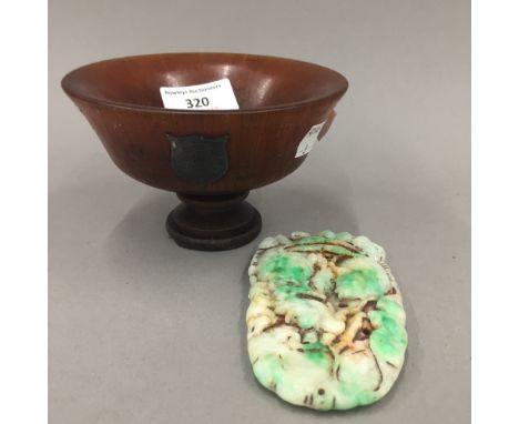 A sterling silver mounted libation cup and a 'jade' carving