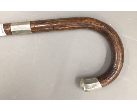A silver mounted walking stick