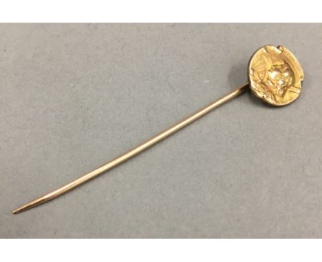 A Continental gold stick pin (1.3 grammes)