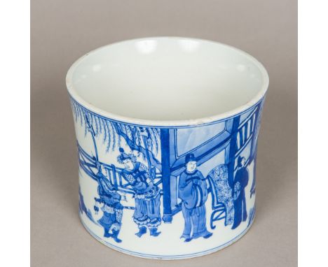 A Chinese blue and white porcelain brush pot, of gently flared circular section, worked in the round with various figures in 