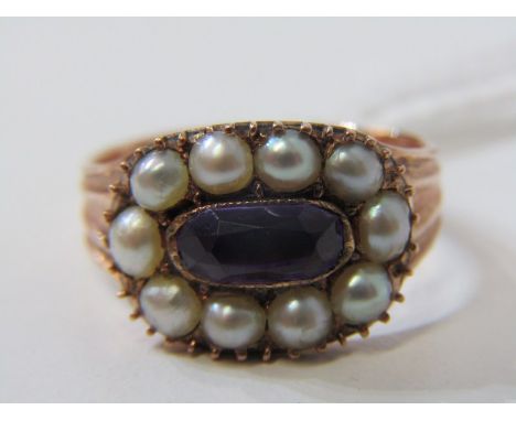 ANTIQUE RING, Georgian yellow gold ring (tests as 9ct) set with an oval amethyst surrounded by pearls, ring size K No chips o