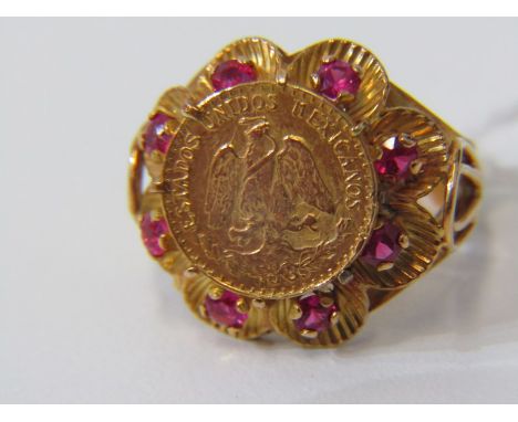 COIN STYLE RING, 9ct yellow gold ring, set a coin style plaque with rubies to the outer, size K. 6.7 grams 