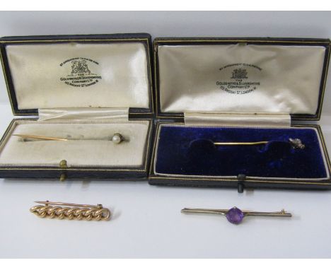 ANTIQUE GOLD JEWELLERY, gold linked bar brooch, tests as high carat, a 9ct gold amethyst bar brooch, a stick pin with finial 