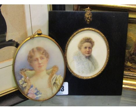 MINIATURE PORTRAIT, oval framed pendant miniature portrait "Young lady with fur collar"; together with one acorn clasp mounte