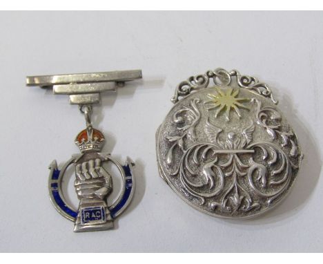 SILVER PENDANTS, circular silver pendant with foliate decoration in relief together with a silver enamel pendant 